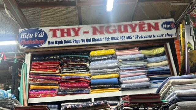 Thy Nguyen 05 Tailor Inside Hoi An fabric market