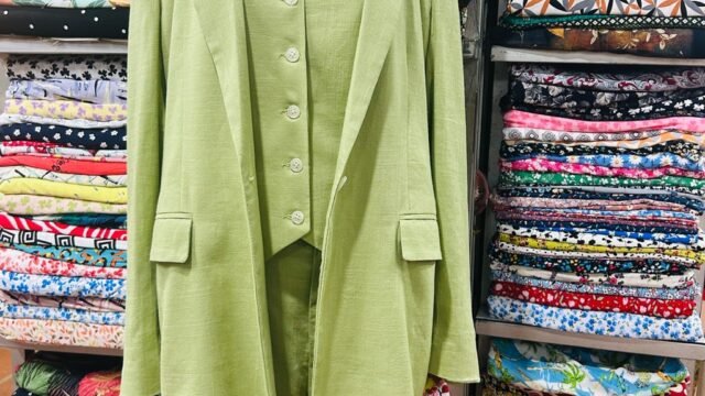 Thy Nguyen 05 Tailor Inside Hoi An fabric market